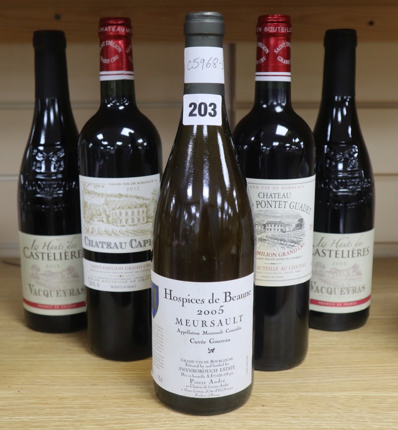 Five bottles of wine: Hospices de Beaune 2005 Meursault, two Grand Cru Saint-Emillion 2014 and two Vacqueyras 2015